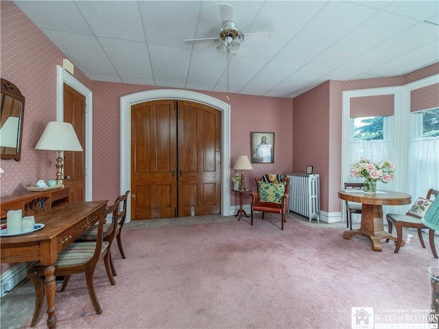 12 Central Ave, Portland, NY 14716 - office area featuring wallpapered walls, light carpet, a ceiling fan, and radiator heating unit