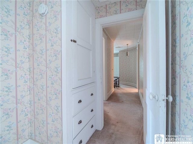 12 Central Ave, Portland, NY 14716 - hallway featuring light carpet and wallpapered walls