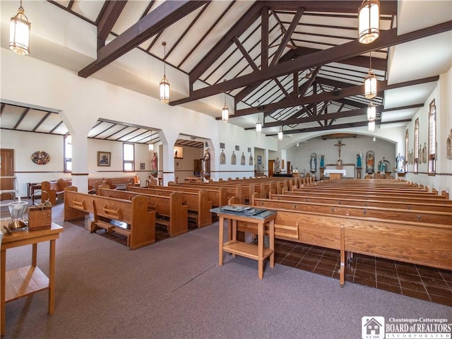 12 Central Ave, Portland, NY 14716 - misc room with carpet flooring, arched walkways, high vaulted ceiling, and beamed ceiling