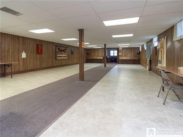 12 Central Ave, Portland, NY 14716 - below grade area featuring wood walls, tile patterned floors, and a drop ceiling