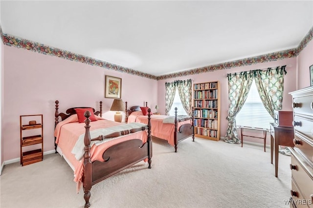 9555 The Maples, Clarence, NY 14031 - bedroom with light colored carpet and baseboards