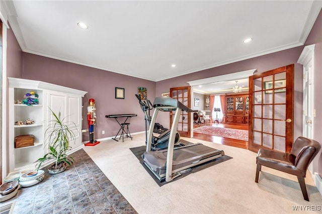 9555 The Maples, Clarence, NY 14031 - exercise area with ornamental molding, a chandelier, and recessed lighting