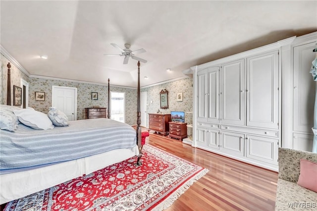 9555 The Maples, Clarence, NY 14031 - bedroom with wallpapered walls, light wood-style floors, crown molding, and a ceiling fan