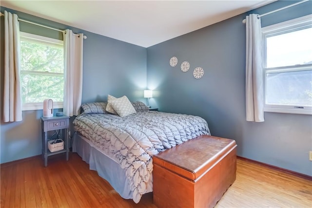 85 Campfire Rd N, Henrietta, NY 14467 - bedroom featuring light wood-style floors and multiple windows