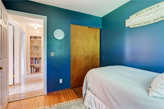85 Campfire Rd N, Henrietta, NY 14467 - bedroom featuring wood finished floors and a closet