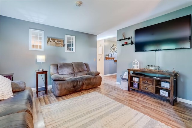 85 Campfire Rd N, Henrietta, NY 14467 - living area featuring wood finished floors and baseboards