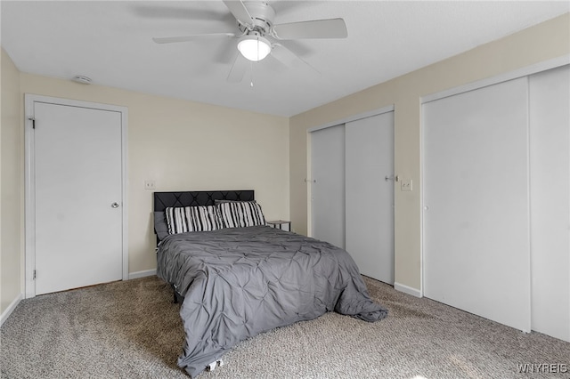 335 S Cayuga Rd Unit B, Amherst, NY 14221 - carpeted bedroom featuring multiple closets and ceiling fan