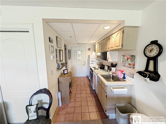 1 Pratt Ave Unit 302, Chautauqua, NY 14722 - kitchen with white range with electric cooktop, light countertops, light tile patterned floors, a paneled ceiling, and recessed lighting