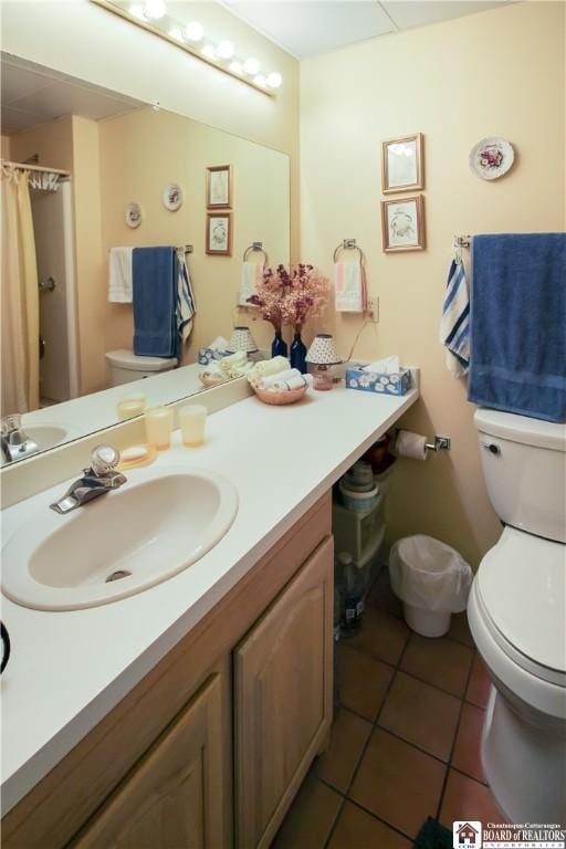 1 Pratt Ave Unit 302, Chautauqua, NY 14722 - bathroom featuring tile patterned floors, vanity, and curtained shower
