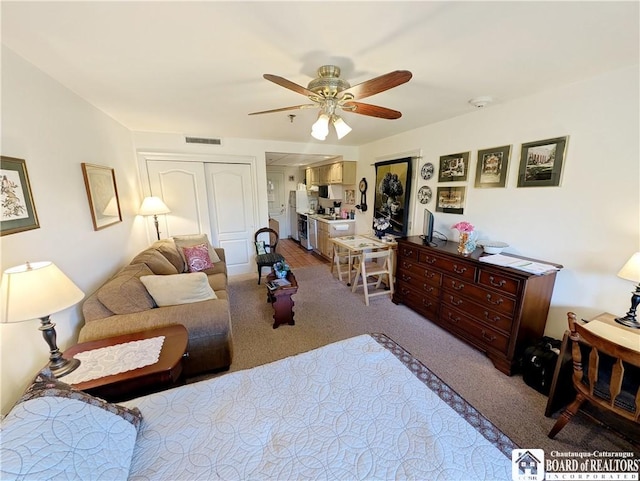 1 Pratt Ave Unit 302, Chautauqua, NY 14722 - bedroom with light colored carpet and a ceiling fan