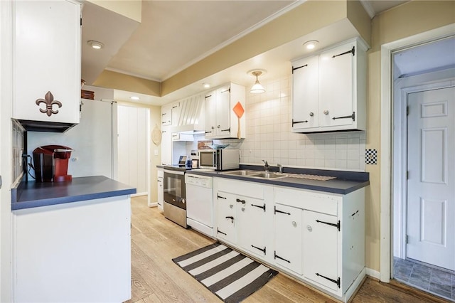 28 Crossfield Rd, Perinton, NY 14450 - kitchen featuring dark countertops, white dishwasher, crown molding, light wood-type flooring, and white cabinetry