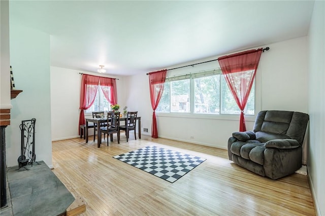 28 Crossfield Rd, Perinton, NY 14450 - living room featuring wood finished floors and baseboards