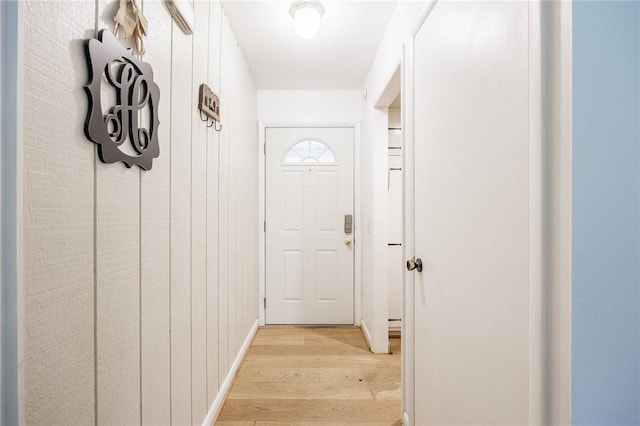 28 Crossfield Rd, Perinton, NY 14450 - doorway featuring light wood finished floors and baseboards