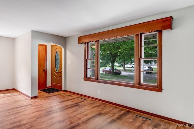 44 Deuro Dr, Niagara Falls, NY 14304 - foyer entrance featuring wood finished floors and arched walkways