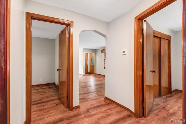 44 Deuro Dr, Niagara Falls, NY 14304 - hallway featuring arched walkways and light wood-type flooring