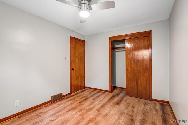 44 Deuro Dr, Niagara Falls, NY 14304 - unfurnished bedroom featuring light wood finished floors, a closet, and ceiling fan