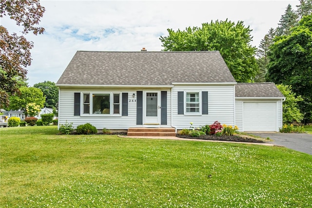 264 Harvest Dr, Greece, NY 14626 - cape cod house featuring asphalt driveway, an attached garage, a front lawn, and roof with shingles