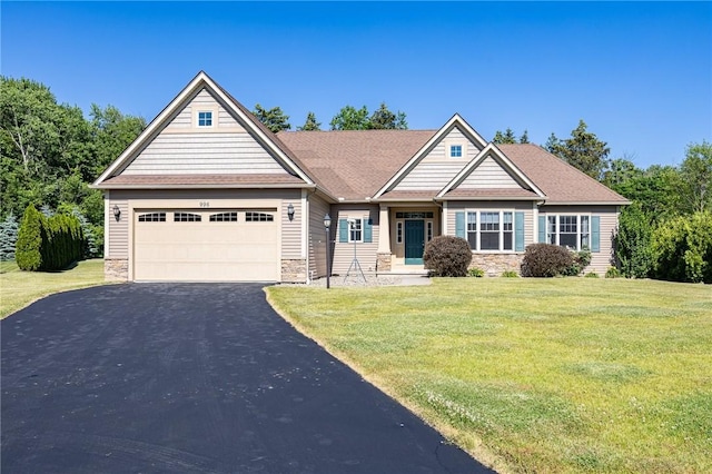 996 Summer Creek Ln, Webster, NY 14580 - view of front facade featuring stone siding, driveway, an attached garage, and a front lawn