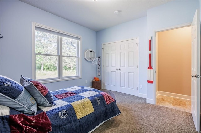 996 Summer Creek Ln, Webster, NY 14580 - carpeted bedroom featuring baseboards and a closet