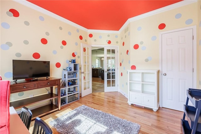 996 Summer Creek Ln, Webster, NY 14580 - bedroom featuring french doors, crown molding, wood finished floors, and wallpapered walls