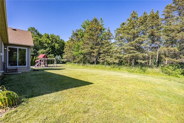 996 Summer Creek Ln, Webster, NY 14580 - view of green lawn featuring a playground