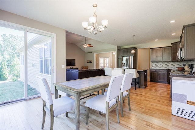 996 Summer Creek Ln, Webster, NY 14580 - dining area with a chandelier, light wood-type flooring, vaulted ceiling, ceiling fan, and recessed lighting