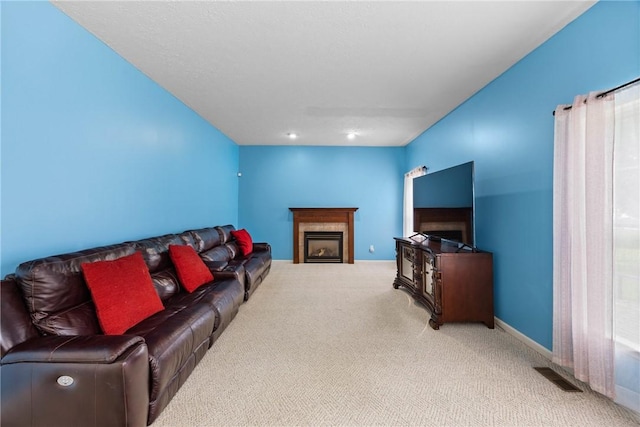 18 Butterfly Ln, Henrietta, NY 14586 - carpeted living area featuring a tiled fireplace