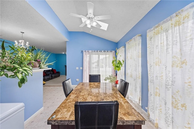18 Butterfly Ln, Henrietta, NY 14586 - dining room with ceiling fan, lofted ceiling, a chandelier, and a textured ceiling
