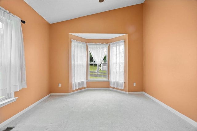 18 Butterfly Ln, Henrietta, NY 14586 - unfurnished room with lofted ceiling and carpet floors