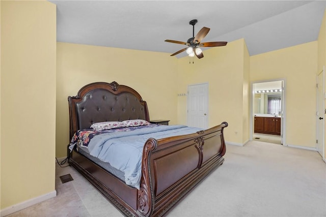 18 Butterfly Ln, Henrietta, NY 14586 - bedroom featuring light colored carpet, lofted ceiling, ensuite bath, and ceiling fan