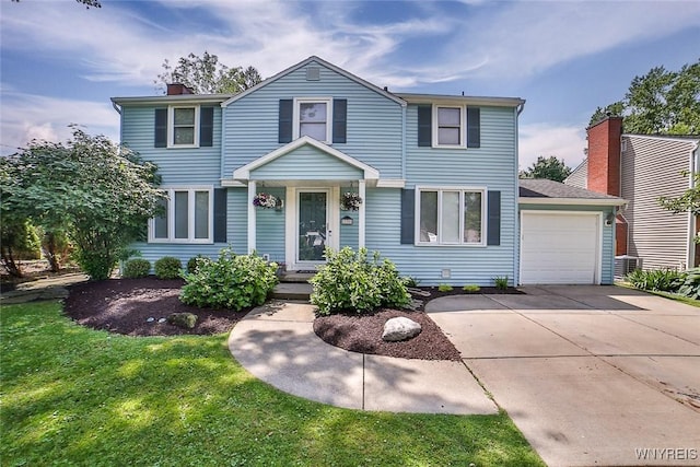 170 Sargent Dr, Amherst, NY 14226 - traditional-style home featuring driveway, a chimney, and a front yard