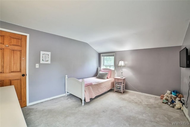 170 Sargent Dr, Amherst, NY 14226 - carpeted bedroom with vaulted ceiling and baseboards