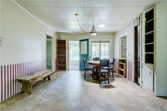 212 Hill Rd, Danby, NY 14001 - dining space featuring concrete flooring and crown molding