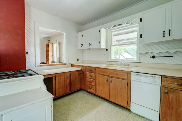 212 Hill Rd, Danby, NY 14001 - kitchen featuring dishwasher, light countertops, light floors, and brown cabinets