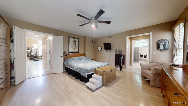 6097 Wellesley Cmn, Clarence, NY 14051 - bedroom with light wood finished floors and ceiling fan