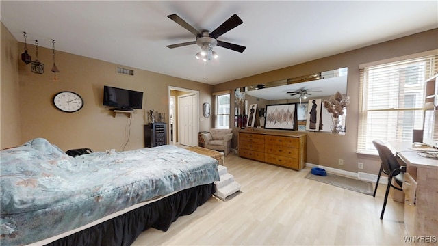 6097 Wellesley Cmn, Clarence, NY 14051 - bedroom featuring wood finished floors and ceiling fan