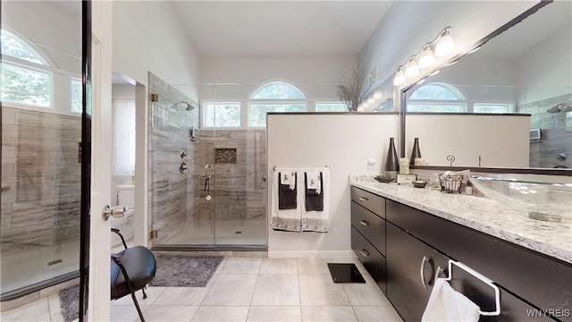 6097 Wellesley Cmn, Clarence, NY 14051 - full bath featuring a stall shower, vanity, and tile patterned floors
