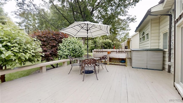 6097 Wellesley Cmn, Clarence, NY 14051 - wooden deck with outdoor dining area