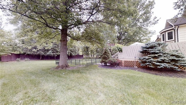 6097 Wellesley Cmn, Clarence, NY 14051 - view of yard featuring a wooden deck