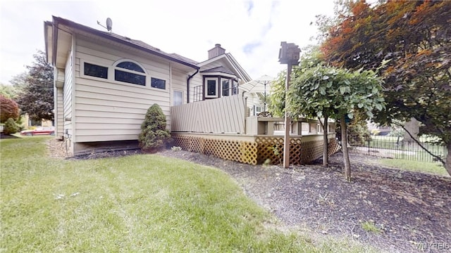 6097 Wellesley Cmn, Clarence, NY 14051 - rear view of house with a deck