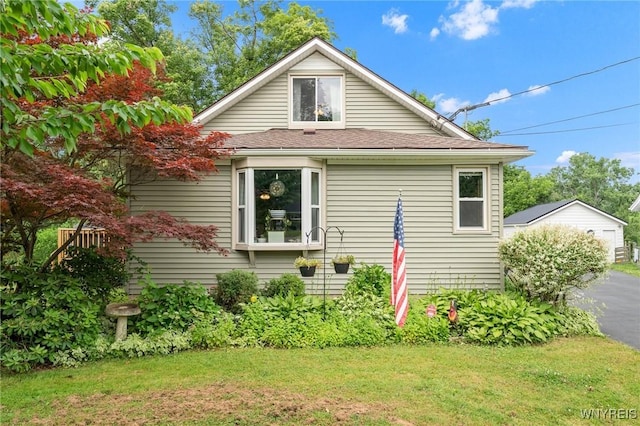 7106 Boston State Rd, Boston, NY 14075 - view of front of property with a front lawn and roof with shingles