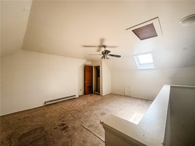 124 Adams St, Rochester, NY 14608 - bonus room with baseboard heating, lofted ceiling, carpet, ceiling fan, and a skylight