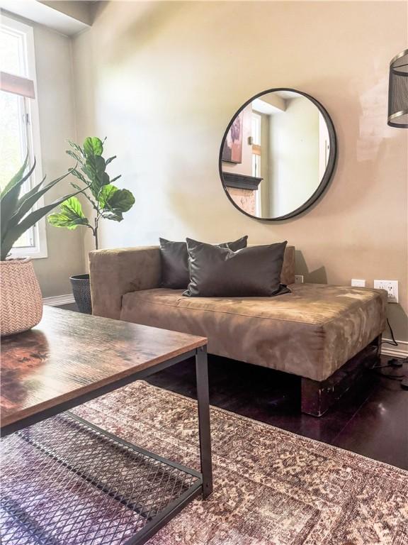 124 Adams St, Rochester, NY 14608 - living room with wood finished floors and healthy amount of natural light
