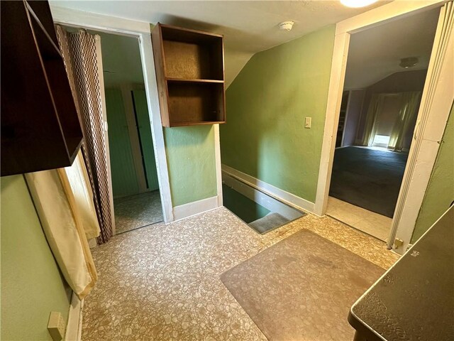 22 N Main St, Elba, NY 14058 - bathroom featuring baseboards and vaulted ceiling