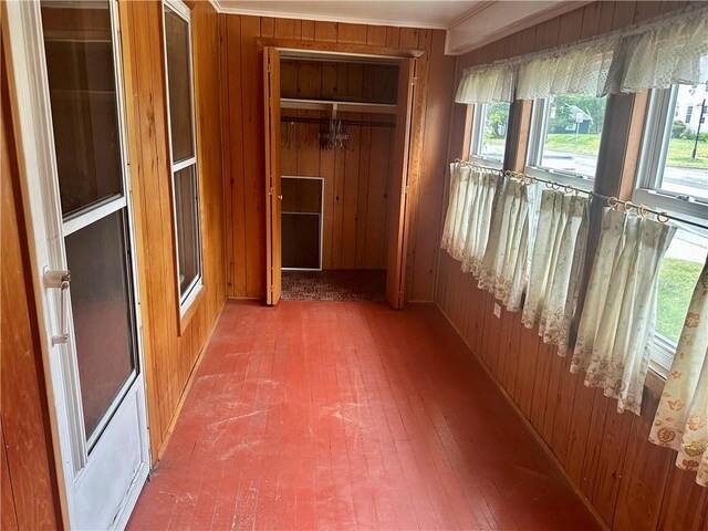 22 N Main St, Elba, NY 14058 - hall featuring wooden walls, plenty of natural light, crown molding, and wood-type flooring