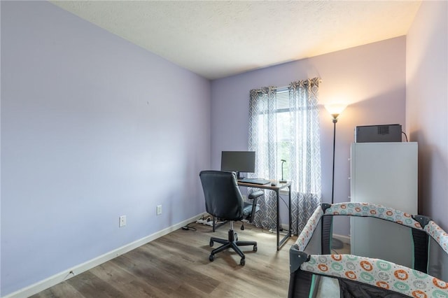 11 Wenrich Cir, Henrietta, NY 14586 - home office with wood finished floors and baseboards
