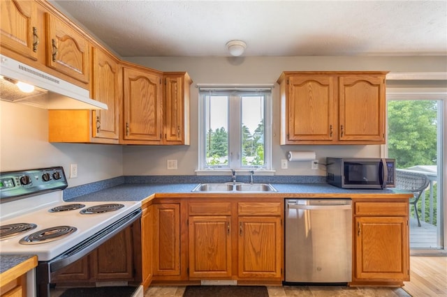 11 Wenrich Cir, Henrietta, NY 14586 - kitchen with appliances with stainless steel finishes, under cabinet range hood, and brown cabinets