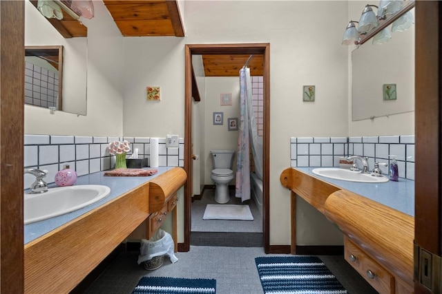 4570 Vine Rd, Jerusalem, NY 14527 - bathroom featuring shower / bath combo with shower curtain, vanity, and tasteful backsplash