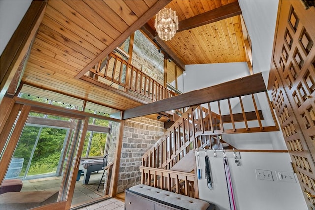 4570 Vine Rd, Jerusalem, NY 14527 - staircase with a wood ceiling with exposed beams, a chandelier, and tile patterned flooring