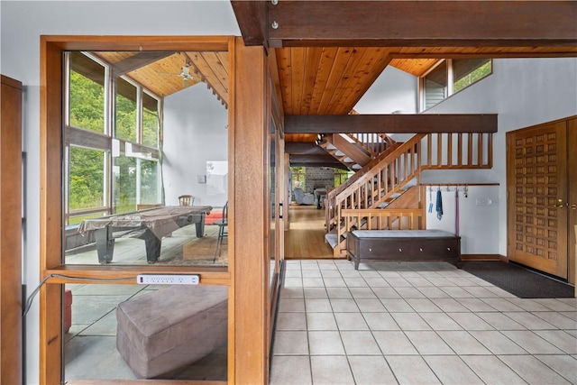 4570 Vine Rd, Jerusalem, NY 14527 - foyer entrance with tile patterned flooring, wood ceiling, and stairway